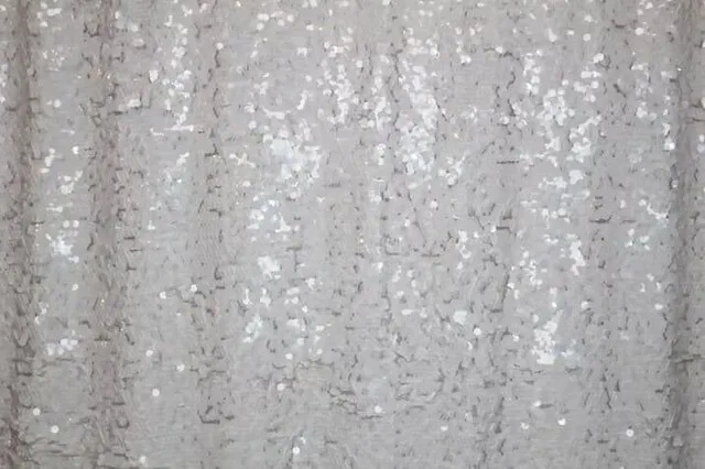 white sequin backdrop