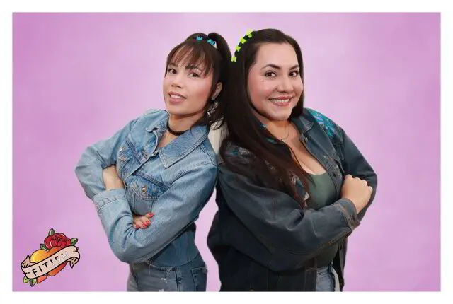 two women posing for an event photography in a corporate event in houston texas