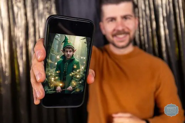 a man showing his elf image generated from the ai photo booth in fort worth texas