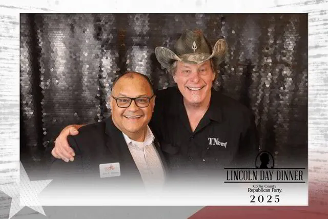 two men smiling for a photo portrait studio in a corporate event